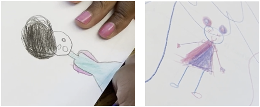  A rough crayon drawing of a woman with a human hand in the shot is on the left, while another crayon drawing of a human female with pigtails is on the right.