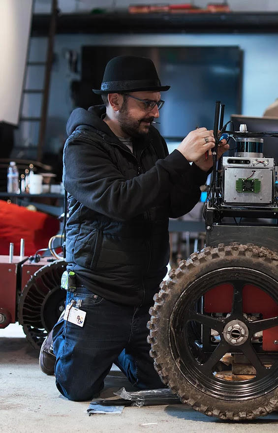 man working on vehicle